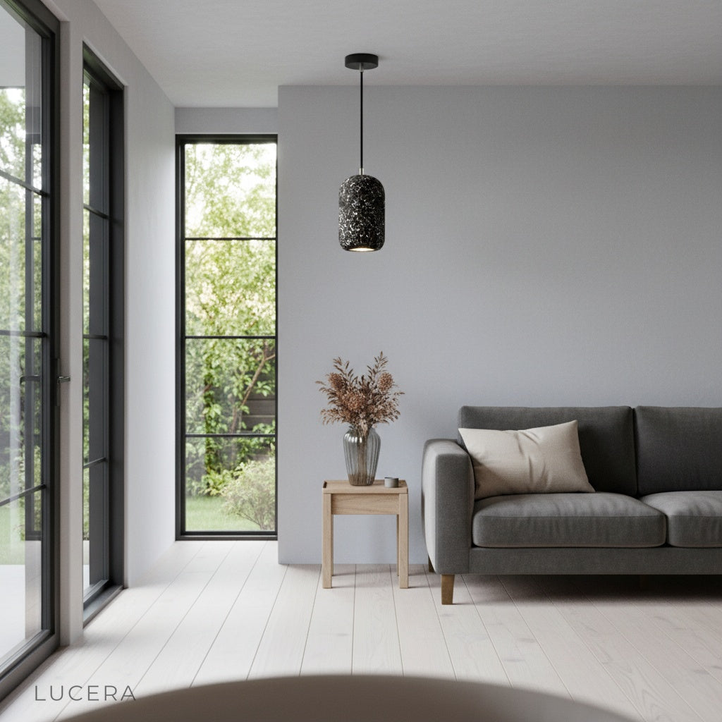 Sun Pendant Light glowing at dusk in minimalist hallway with plants
