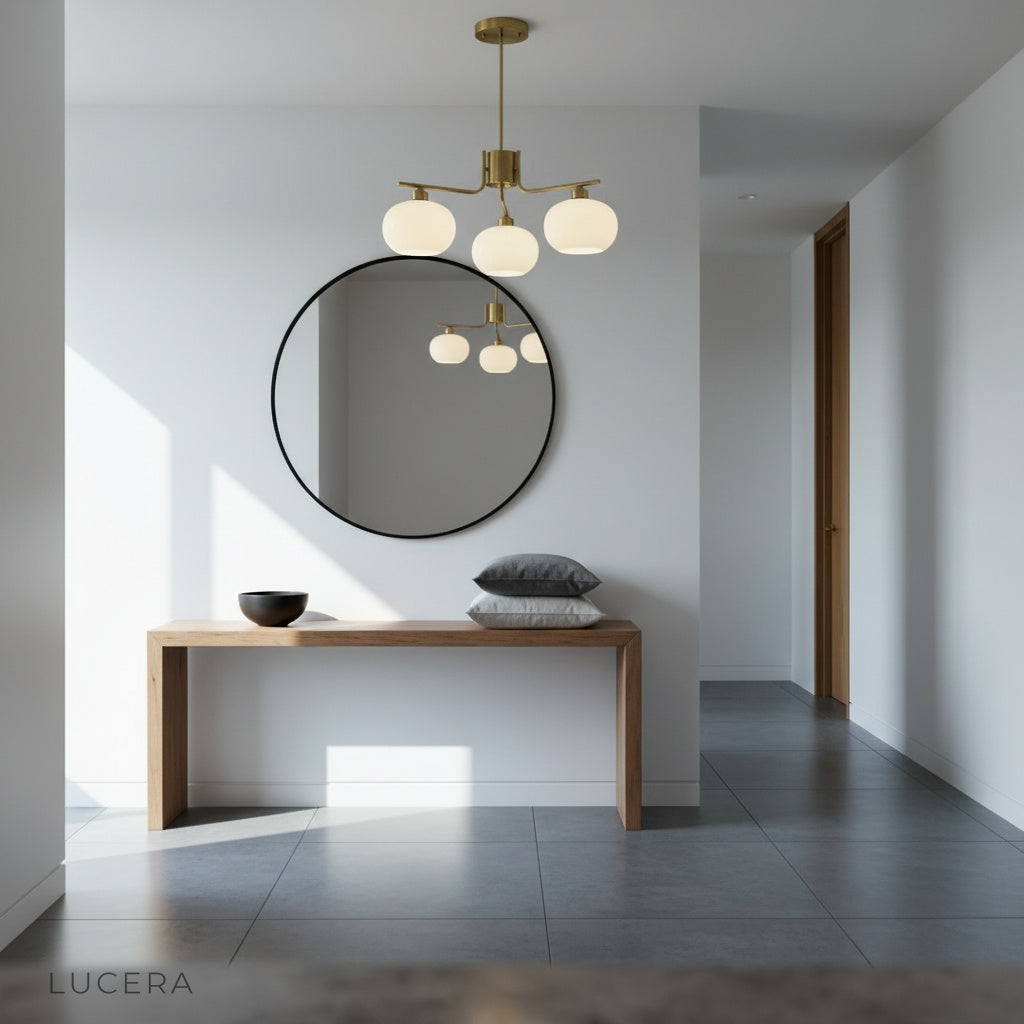 Tempo Chandelier round variant suspended in a bright, airy lounge with neutral-toned furniture