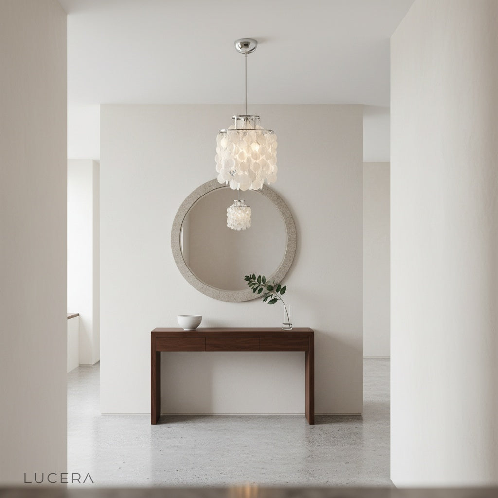 Zwing Chandelier glowing at night in a dark bohemian dining room with pendant shadows on wall