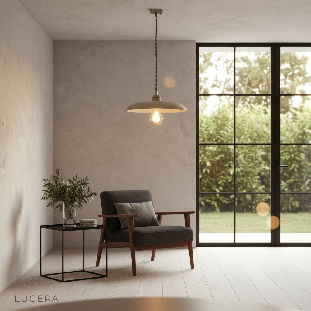 Nighttime ambient shot of Solstice pendant light over dark wood dining table