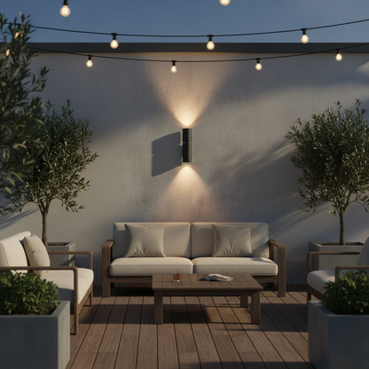 contemporary wall light with dual directional beams highlighting a minimalist outdoor staircase
