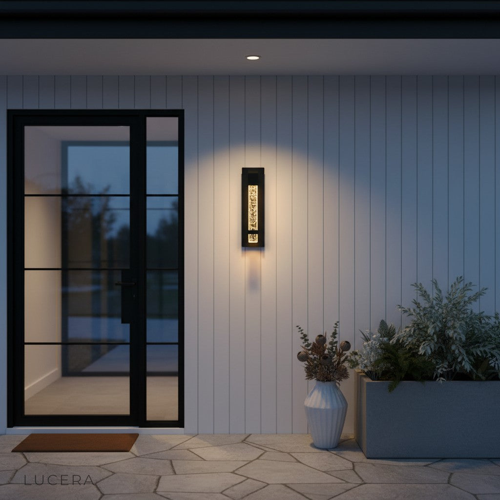 Overhead angle of Hemera Outdoor Sconce showing glass refraction and glow