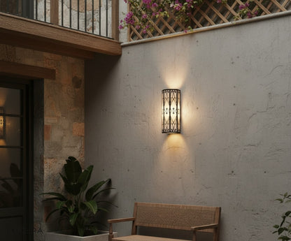Harlow Outdoor LED Lamp warm light highlighting its marble base on a modern entryway