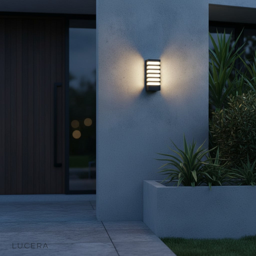 close-up of brushed aluminum finish and integrated LED strip on outdoor wall light