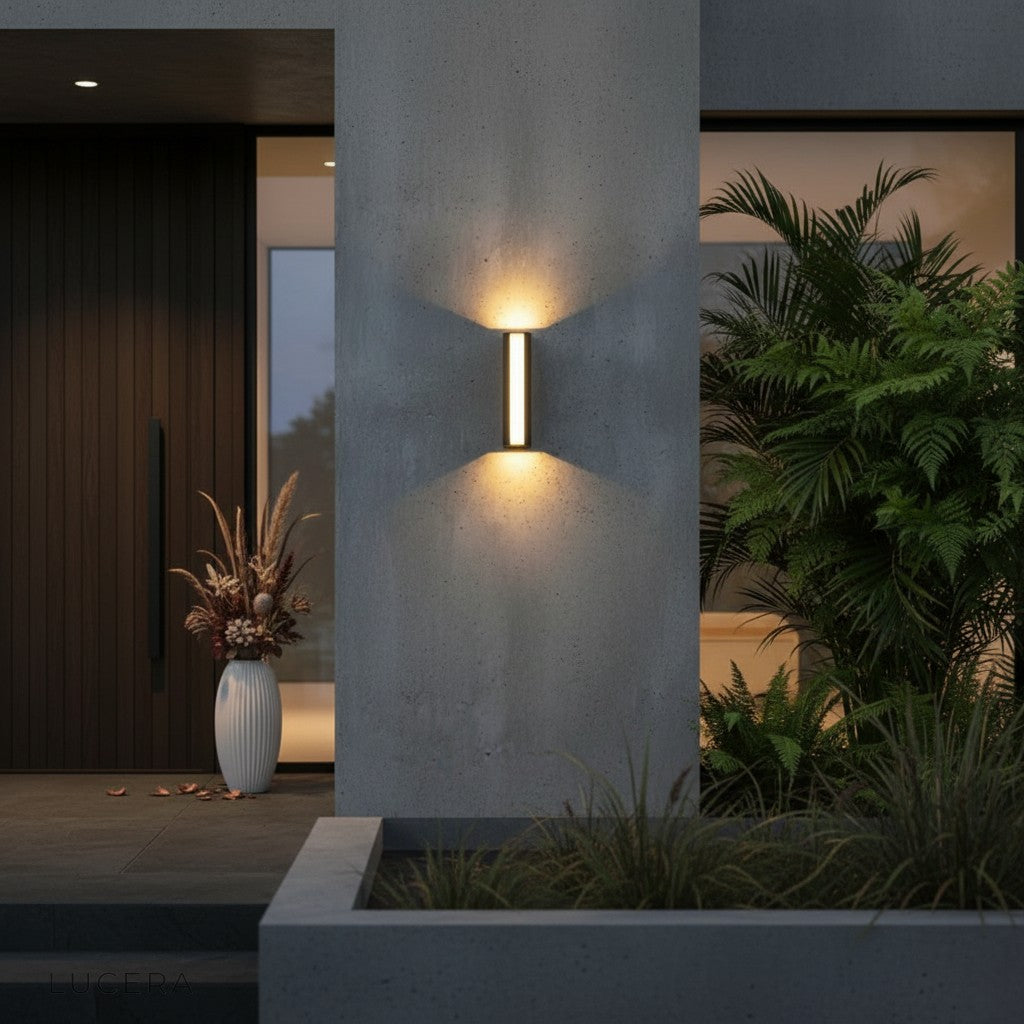 dual color temperature switch detail on black outdoor wall lamp close-up