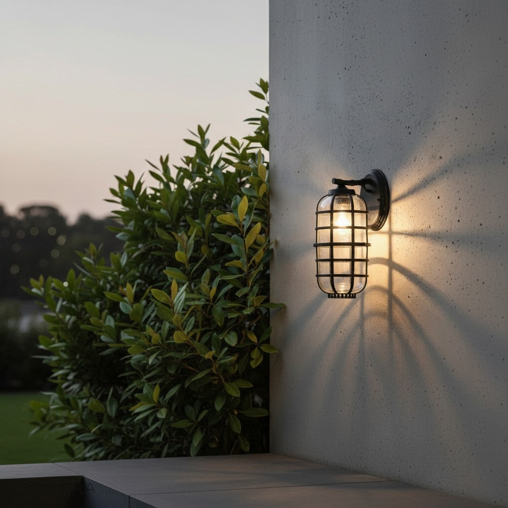 detail shot of Elara fixture's clear glass panels reflecting soft ambient light