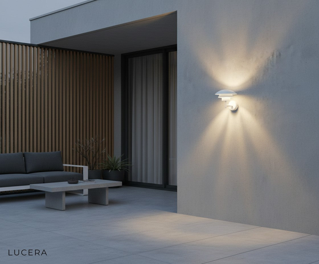 Delphine Outdoor LED Light glowing under pergola at night, blending warm and cool tones