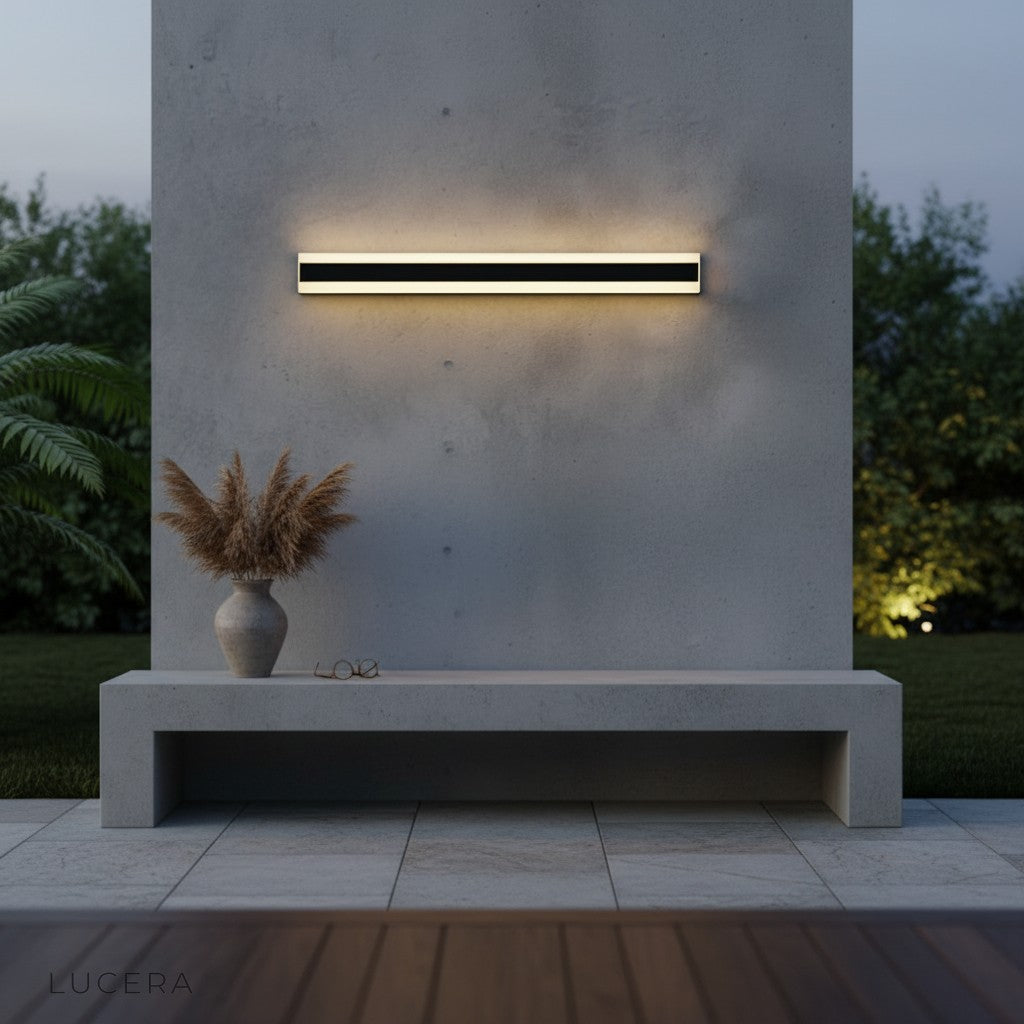 nighttime shot of Kalani LED strip light illuminating a poolside wall