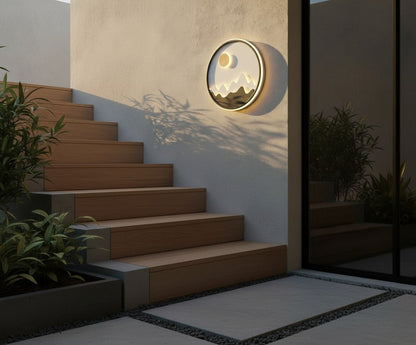 round outdoor sconce glowing against brick facade with subtle shadow play on surface