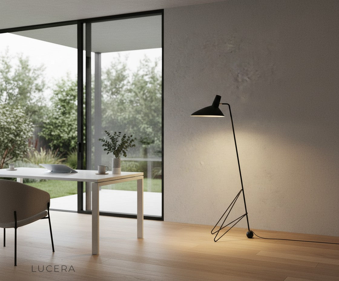 peridot tripod lamp in entryway with soft shadow play on floor