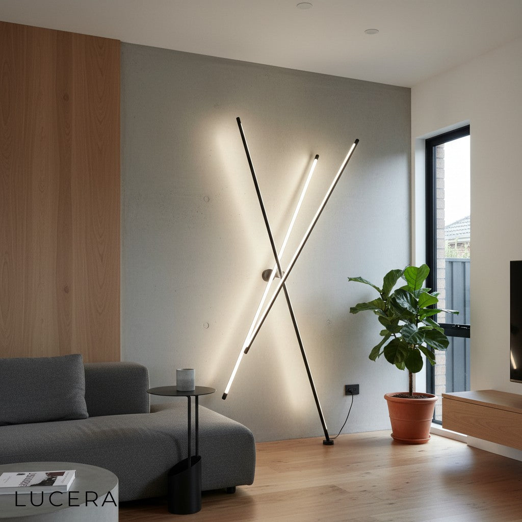 ambient nighttime shot of black tripod floor lamp glowing softly in dark bedroom