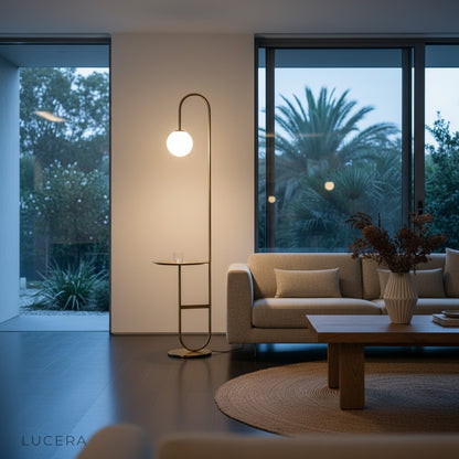 Chrysoprase floor lamp with warm ambient glow illuminating a dark modern bedroom at night