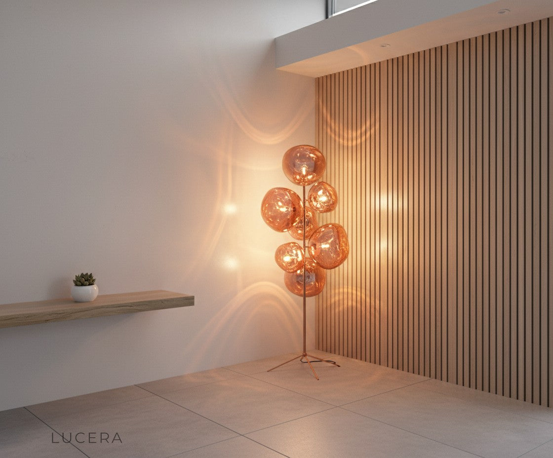 sculptural acrylic floor lamp with warm ambient light in stylish reading corner