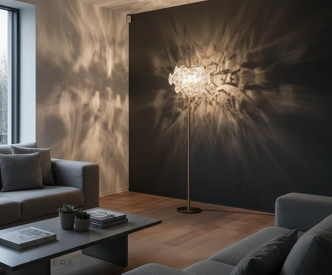 copper and crystal floor lamp beside armchair in stylish minimalist home office