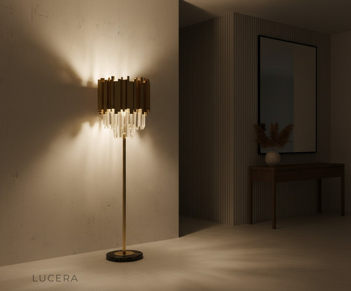 evening ambience of gold and cobalt crystal lamp next to velvet lounge chair