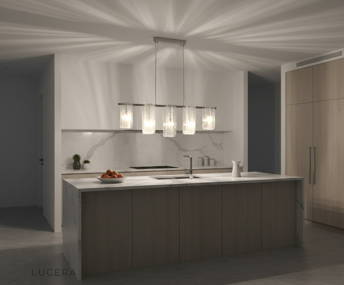 Fuchsia Liora linear pendant glowing at night in a cozy lounge with dark walls and warm accents