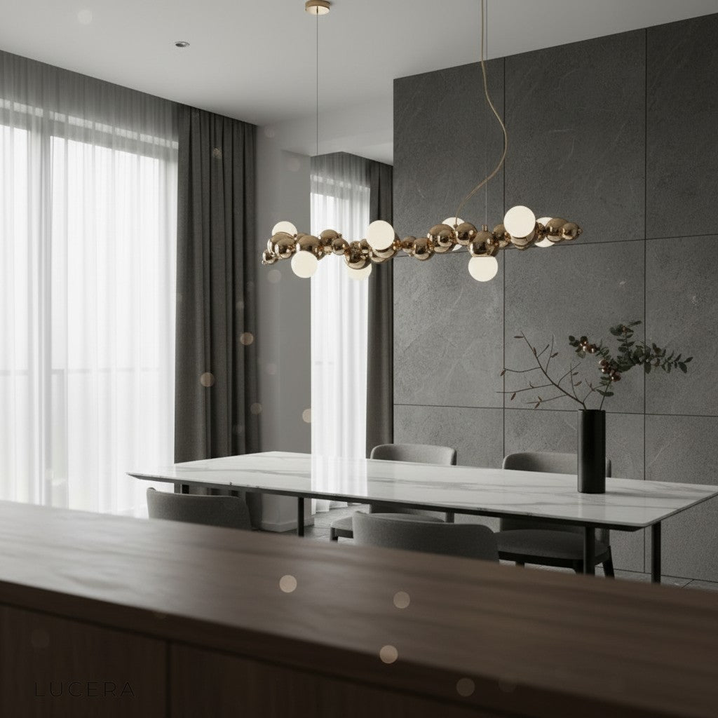 nighttime ambient shot of Byzantium chandelier glowing softly in cozy living room corner