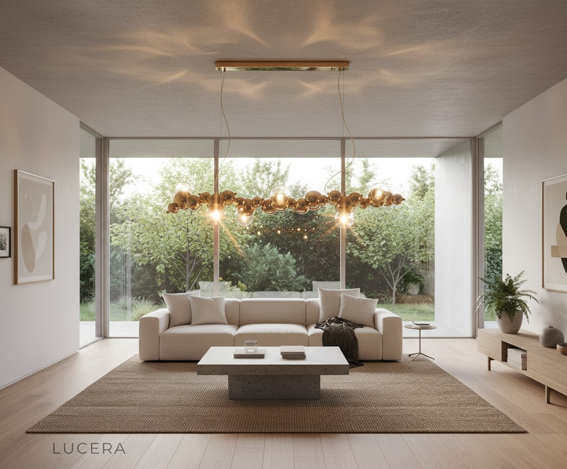 evening lifestyle view of Lucera chandelier in open-plan space with warm inviting glow