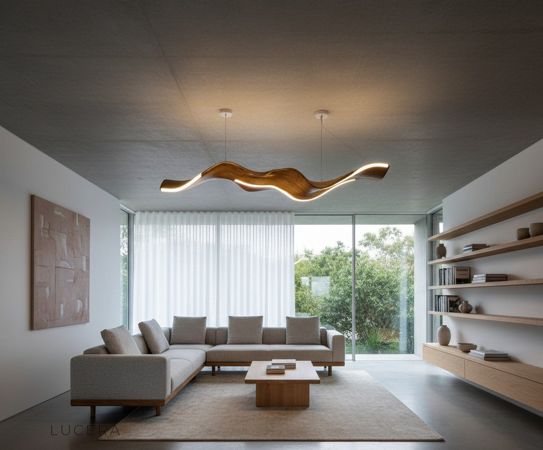 full room view of leaf-shaped LED chandelier as focal point in open-concept space