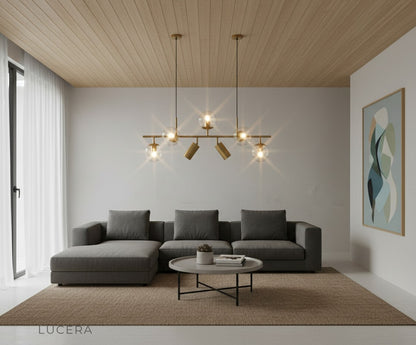evening ambient shot of pendant chandelier with glass balls over rustic wood table