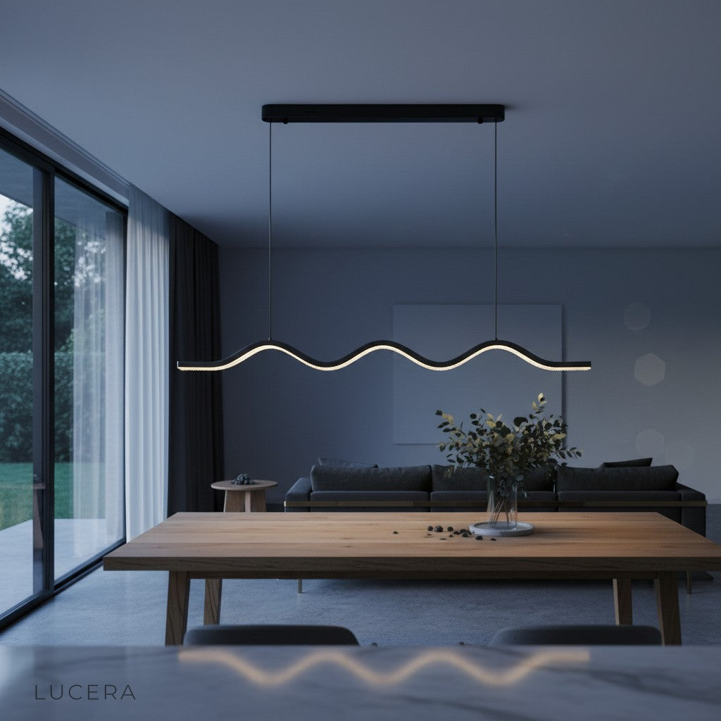 Cordovan chandelier glowing in dark interior with dramatic shadows and pearl reflections