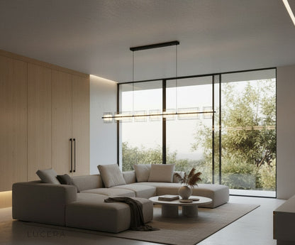 Icterine chandelier glowing at dusk in elegant hallway with reflective surfaces