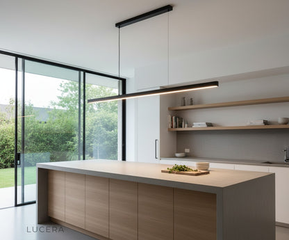 Palatinate chandelier glowing with warm light in dark modern hallway with concrete walls