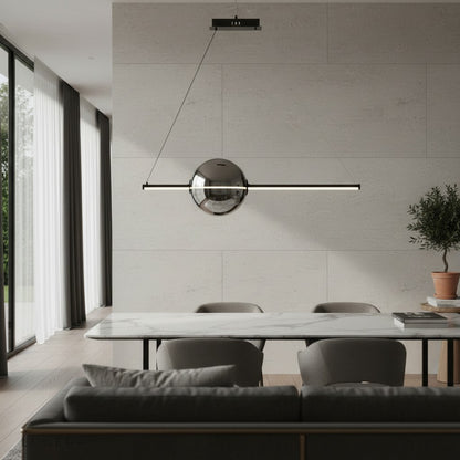 Bjorn chandelier above a round marble table in a chic urban apartment setting