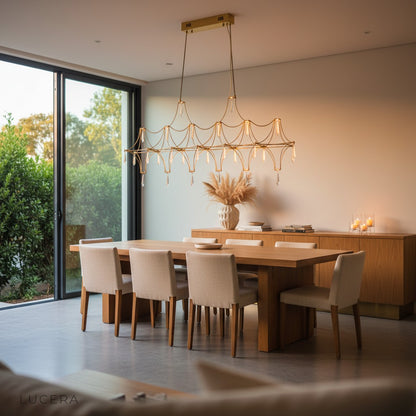 detail of crystal strands and stainless steel arms on Leif chandelier