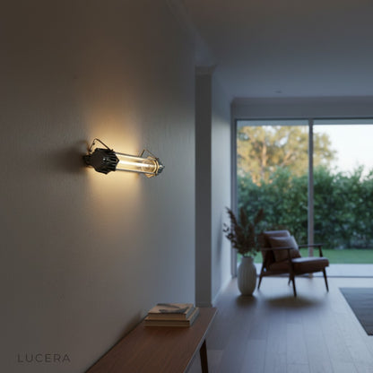 Vigrid Faulensee wall lamp illuminated in a modern bedroom with warm ambient glow on textured wall