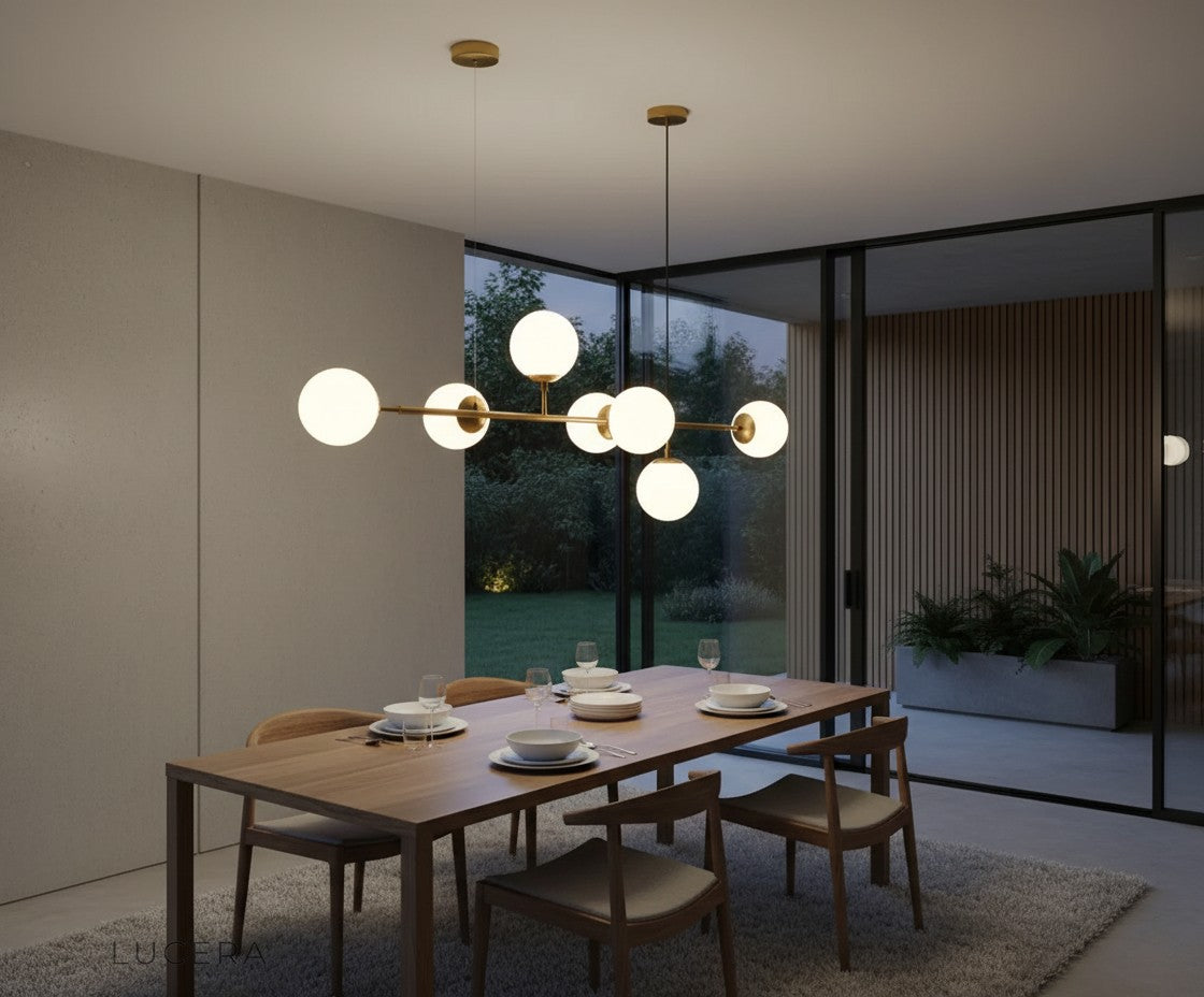 overhead view of Dag three-light fixture highlighting symmetrical glass sphere arrangement