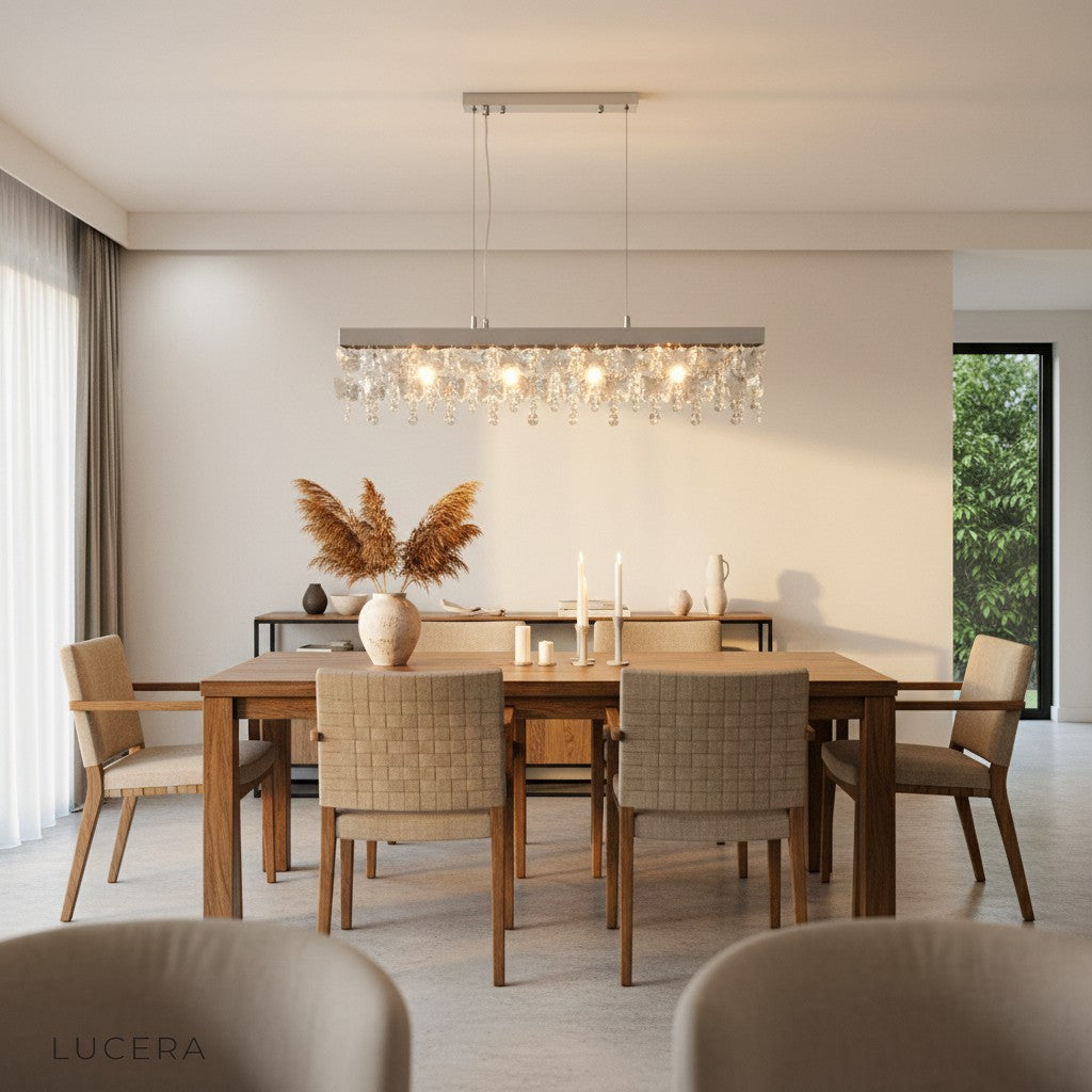 detail view of Hlin chandelier crystal prisms and chrome finish reflecting soft glow