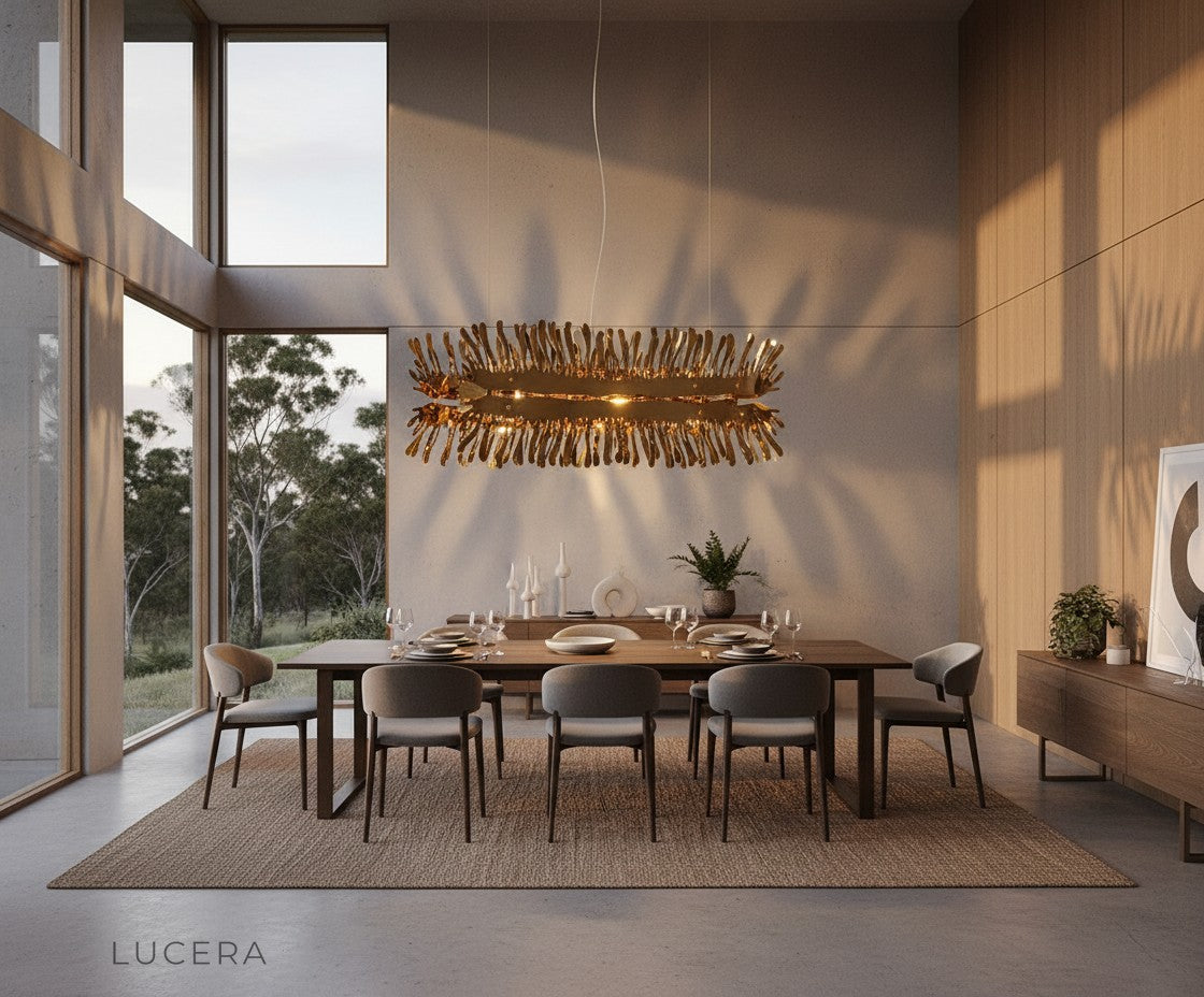 Magne chandelier in bright dining space with elegant gold metallic frame