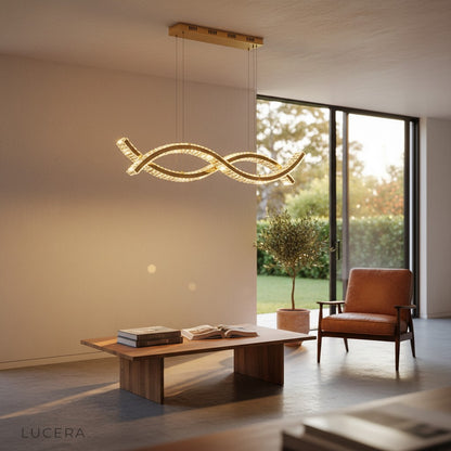 evening shot of Natt wave chandelier casting soft shadows in cozy bedroom
