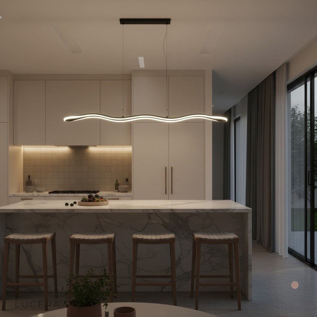 side profile of wave pendant lamp showcasing curved silhouette and metallic finish