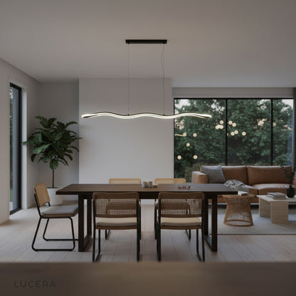 cool white light setting on Skadi Wave pendant lamp against clean white wall