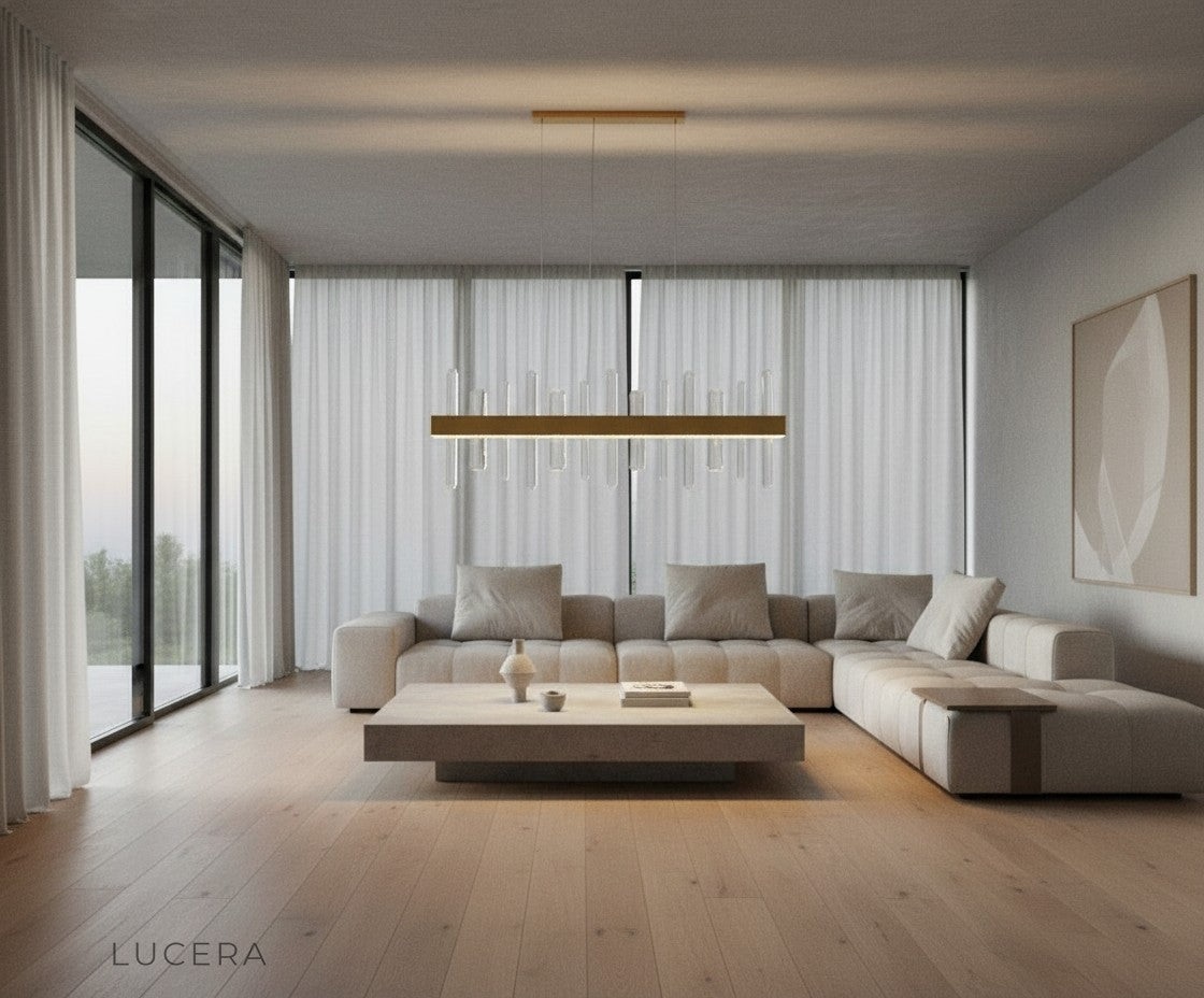Alma rectangular chandelier in gold finish above chic entryway with mirror and console
