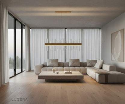 Alma rectangular chandelier in gold finish above chic entryway with mirror and console