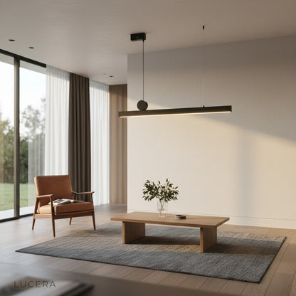 Angelo chandelier in a loft living space with exposed brick and warm evening light