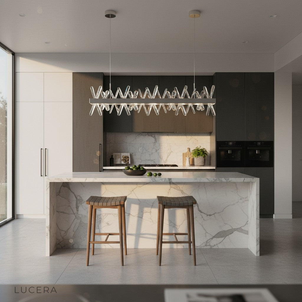 Arte rectangle chandelier over marble kitchen island with gold accents
