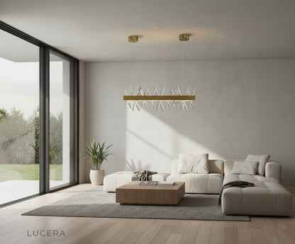 gold rectangle crystal chandelier illuminating dark elegant lounge at dusk