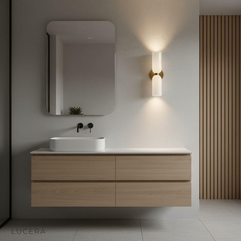 Nighttime lifestyle shot of Dolce double wall sconce casting elegant ambient light in lounge