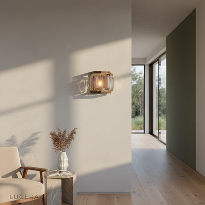 Dono Vibrant Prism Wall Sconce illuminated at night in contemporary hallway with prismatic wall shadows