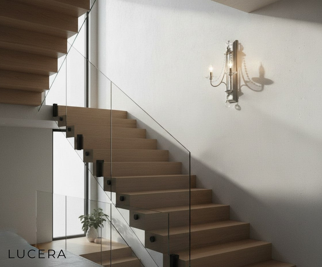 Silver candle sconce with crystals accenting a reading nook with armchair