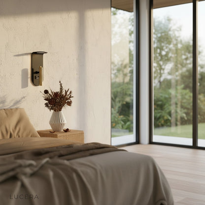 detail view of acrylic diffuser and brushed gold finish on Fuoco wall sconce