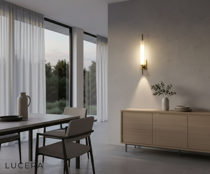 aesthetic lifestyle view of Gatto sconce in a chic living room corner with warm accent lighting