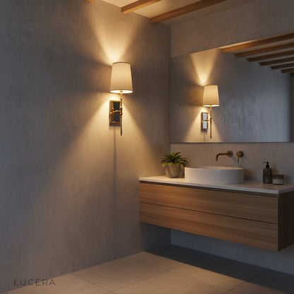 Grido wall lamp warm light casting shadows in stylish reading corner