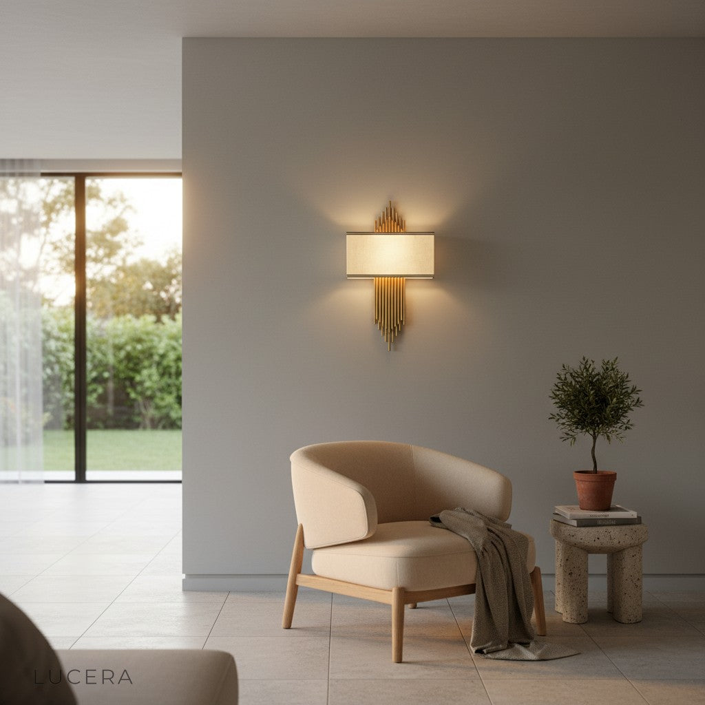 Leone wall sconce in dining room casting ambient glow over table with plants
