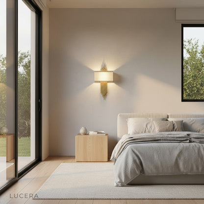 Leone metal wall sconce in stairwell with gold accent and soft fabric glow
