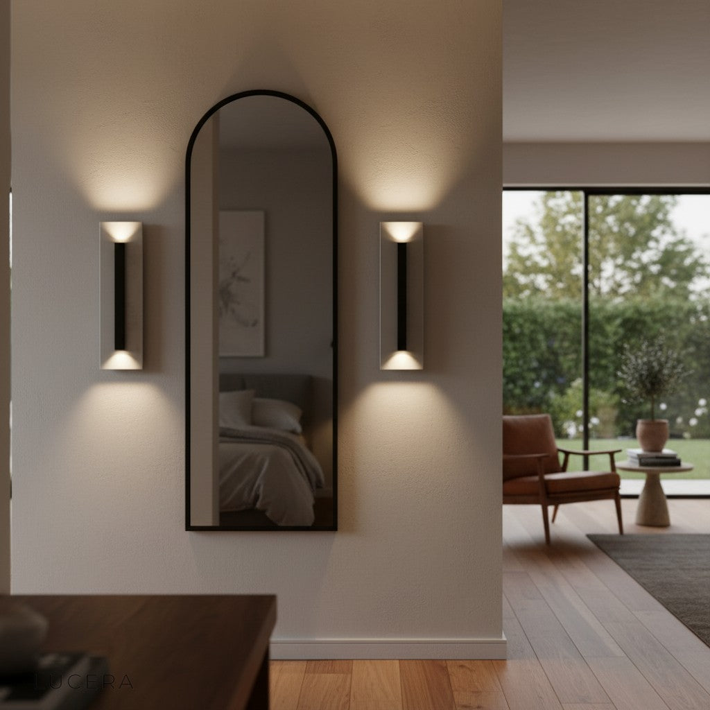 close-up of black iron frame and natural marble texture on Porto wall sconce